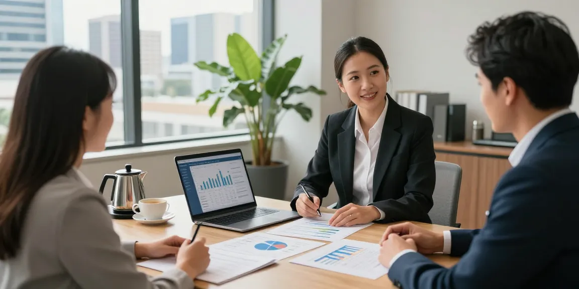 Financial Advice Gold Coast consultation in an elegant office with a couple and financial advisor discussing investment strategies.